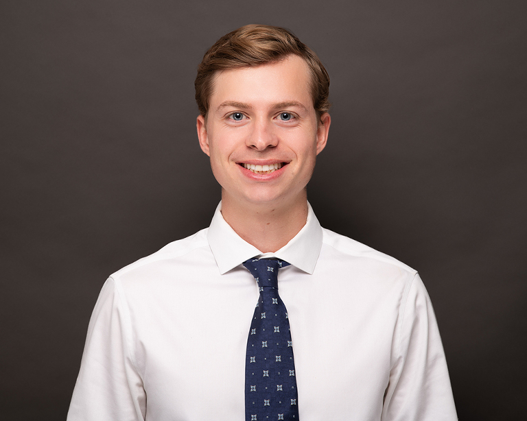 headshots with a dark grey background