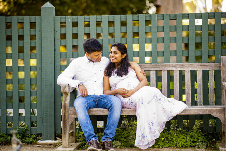 Ronit and Dhwani's pre-wedding photoshoot was packed with fun poses in a  boat, garden, a quirky library, and more - WeddingSutra