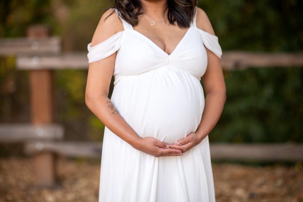 Is A White Dress Good For Maternity Portraits?