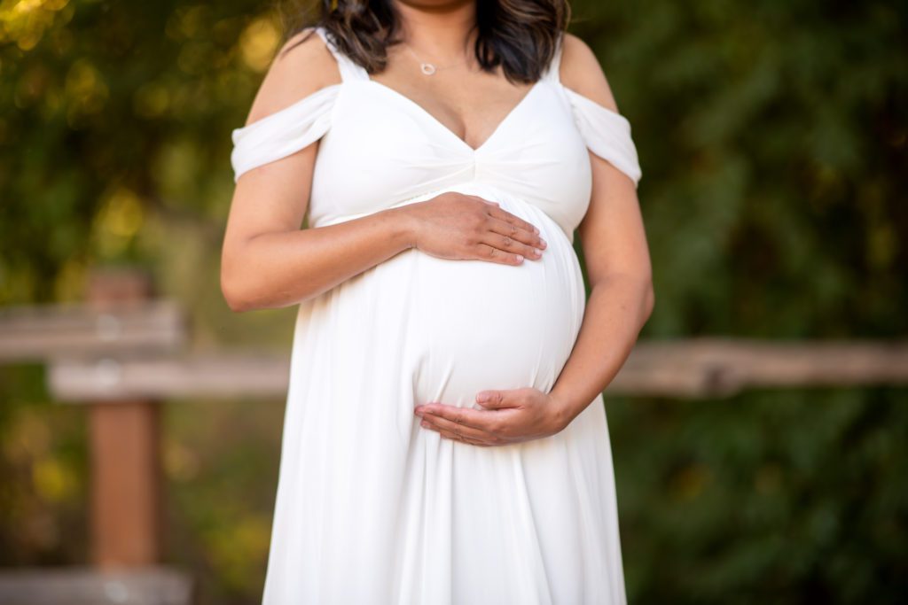 Is A White Dress Good For Maternity Portraits?
