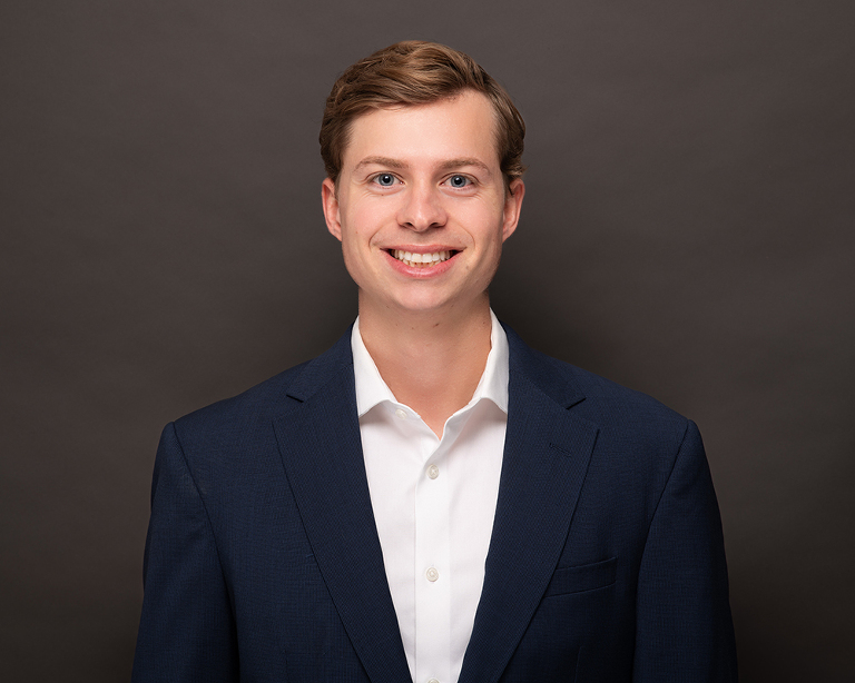 headshots with a dark grey background