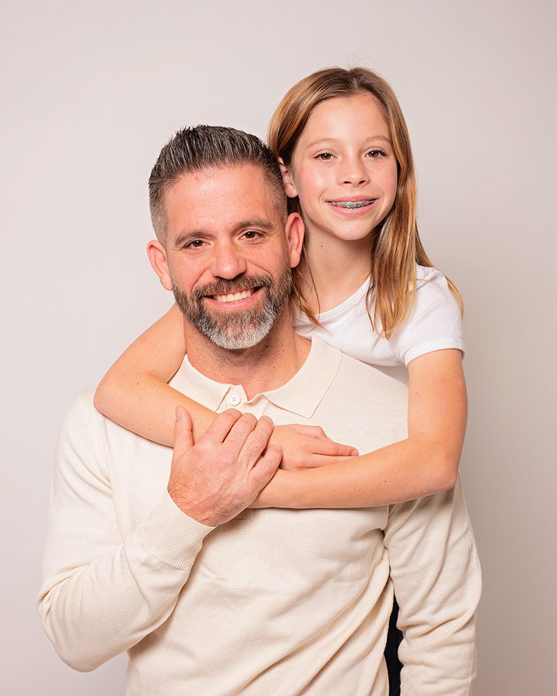 studio family portraits vs outdoor family portraits