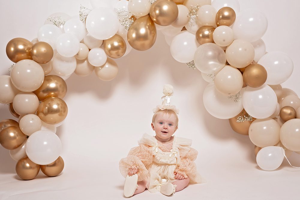 studio cake smash portraits in San Jose