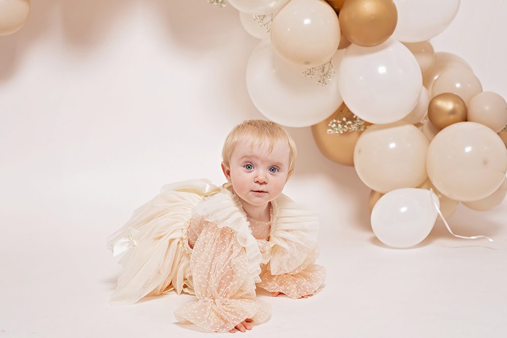 studio cake smash portraits in San Jose