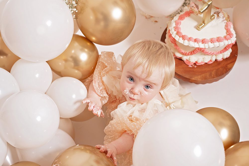 studio cake smash portraits in San Jose