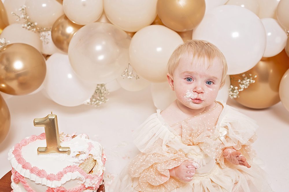 studio cake smash portraits in San Jose