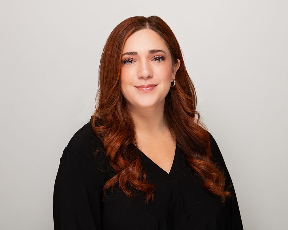 studio headshots on a light grey background