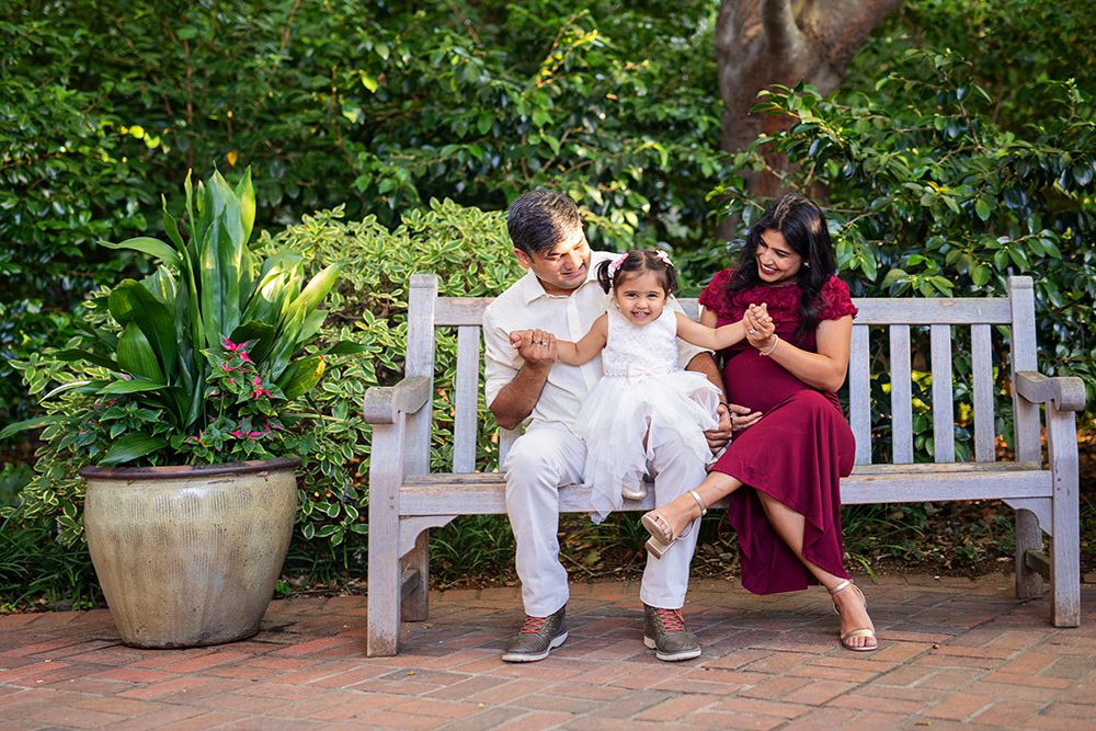 evening maternity pictures at the Elizabeth Gamble Garden